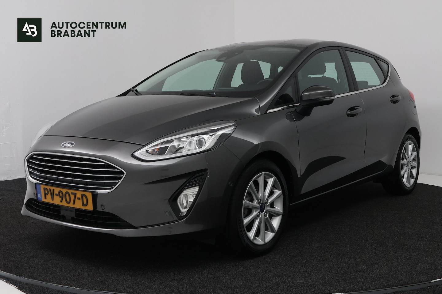 Ford Fiesta - 1.0 EcoBoost Titanium (CAMERA, CRUISE CONTROL ADAPTIEF, NAVIGATIE, PARKEERSENSOREN) - AutoWereld.nl