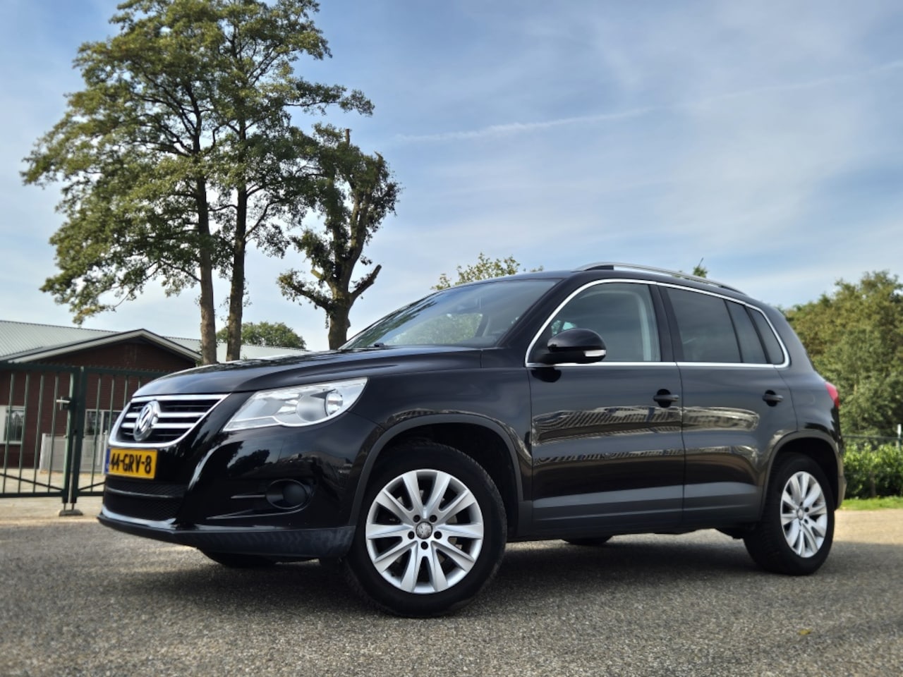 Volkswagen Tiguan - 1.4 TSI Spor. 4M 4x4 - AutoWereld.nl