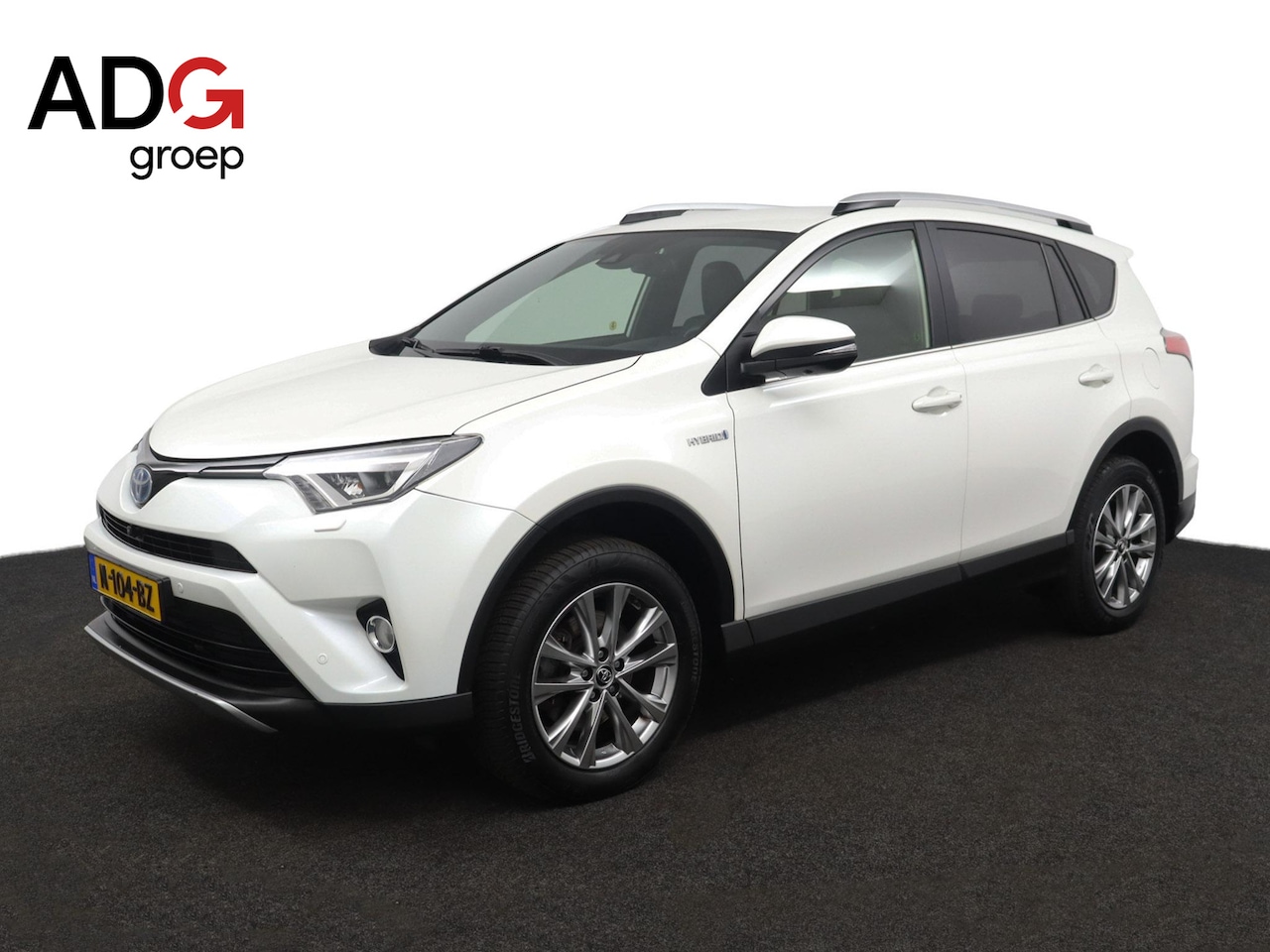 Toyota RAV4 - 2.5 Hybrid AWD Executive Business | Lederen bekleding | Trekhaak | Cruise control | Achter - AutoWereld.nl