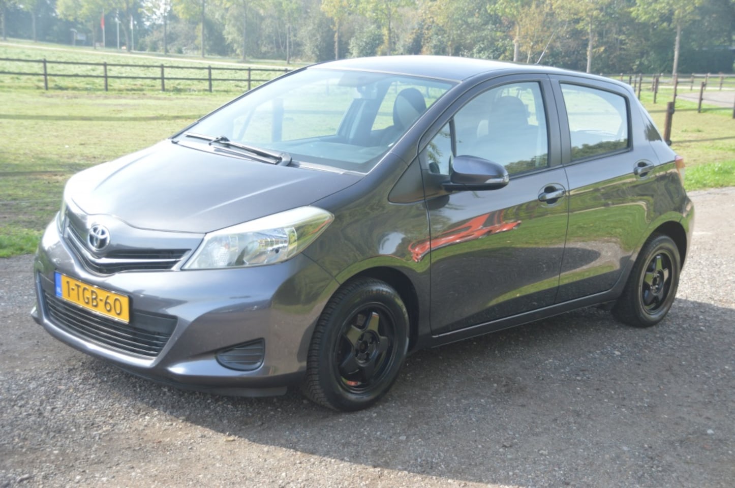 Toyota Yaris - 1.0 VVT-i Aspiration Airco Cruise Camera Navi - AutoWereld.nl