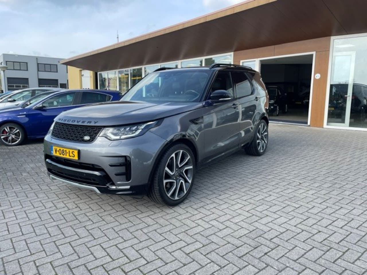Land Rover Discovery - 3.0 Td6 HSE Luxury Grijs Kenteken - AutoWereld.nl