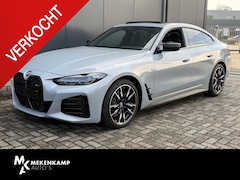BMW i4 - M50 High Executive 84 kWh 19"/SOH 99%/Schuif-kanteldak/Trekhaak/Leder + memory/Stoel + stu