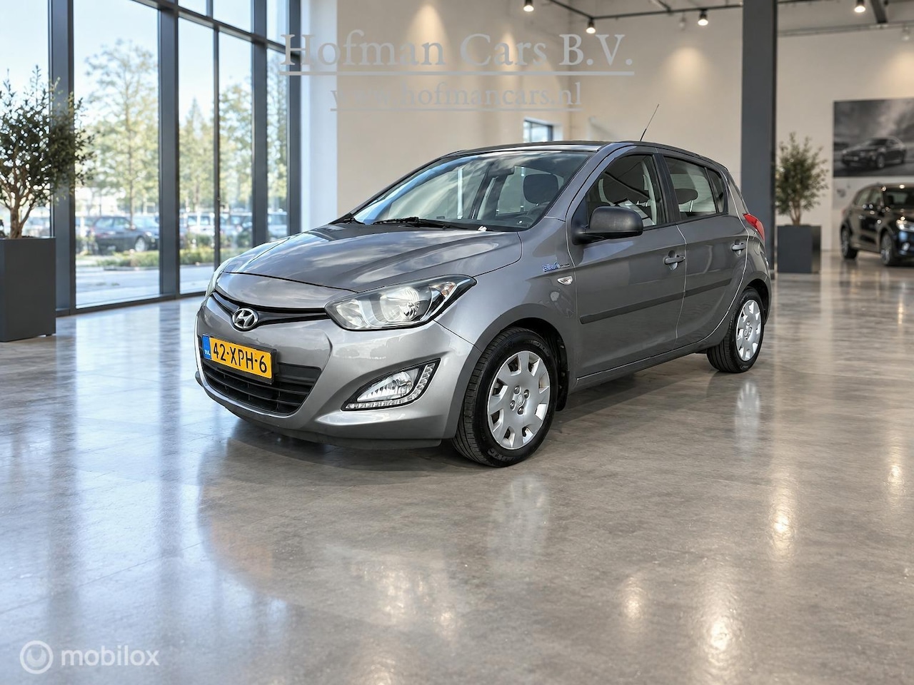 Hyundai i20 - 1.2i Business Edition | Airco | 142.819 km | Grijs Metallic - AutoWereld.nl