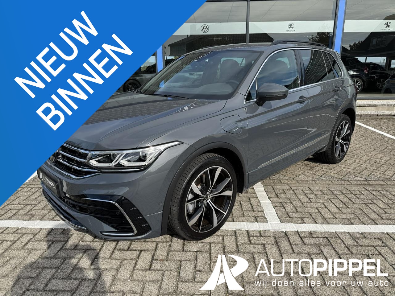 Volkswagen Tiguan - 1.4 TSI eHybrid R-Line DSG |IQ.light |App-Conn. |Camera |Cruise C. |LMV20" |mooi!! - AutoWereld.nl