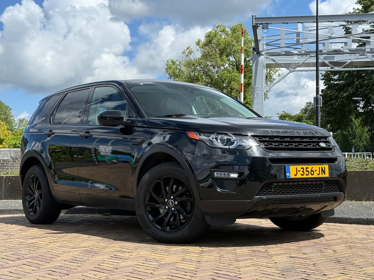 Land Rover Discovery Sport - 2.0 Si4 4WD HSE Luxury 7p Pano, 120.dkm! - AutoWereld.nl