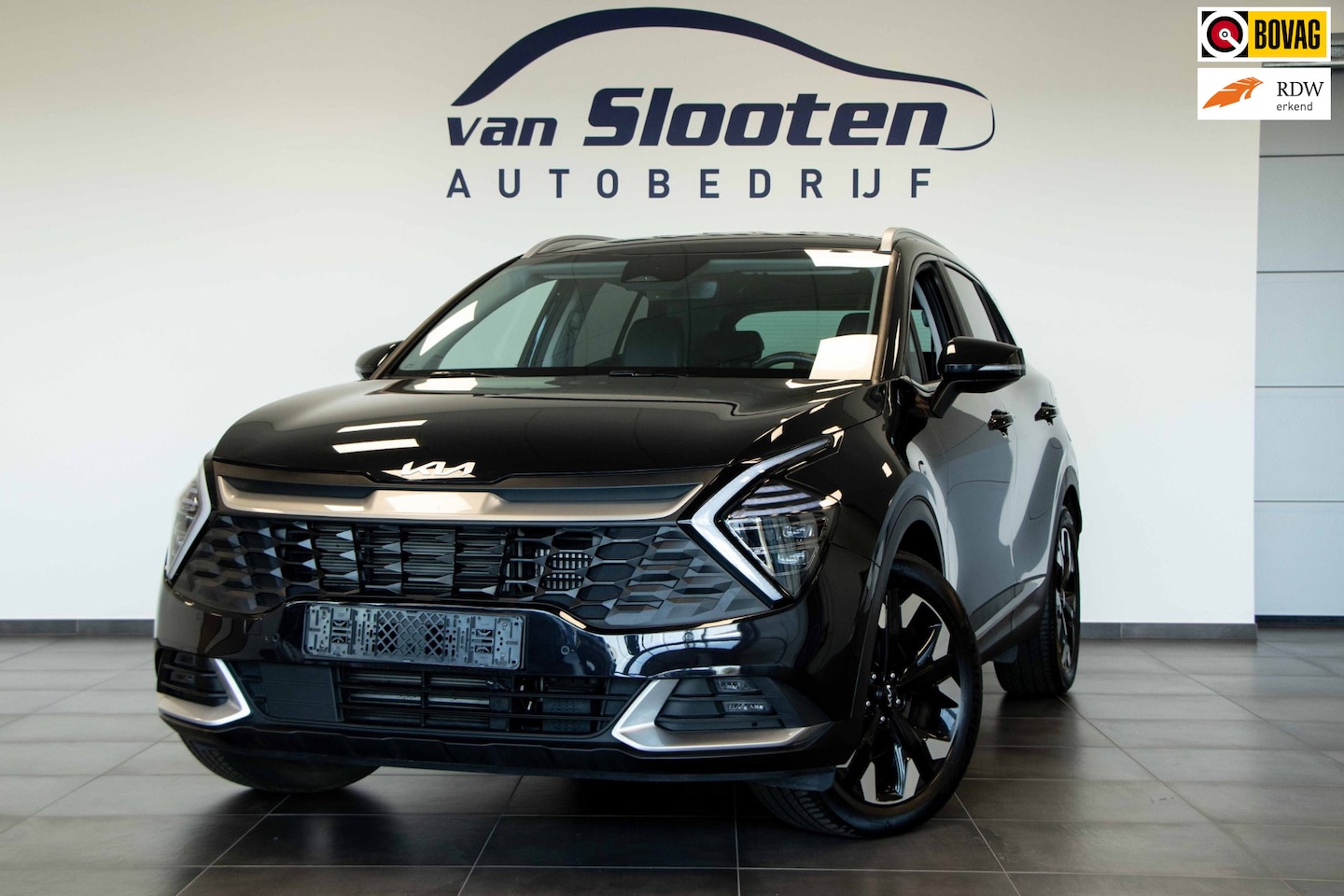 Kia Sportage - 1.6 T-GDi Plug-in Hybrid AWD DynamicPlusLine | Camera | Navi | Trekhaak - AutoWereld.nl