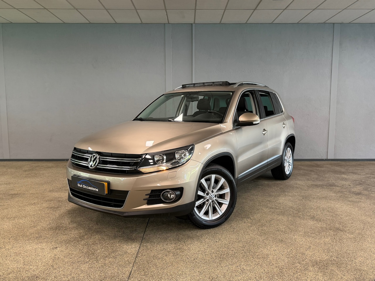 Volkswagen Tiguan - 1.4 TSI Sport&Style PANO|NAVI|STOELVERW|CRUISE|TREKHAAK - AutoWereld.nl