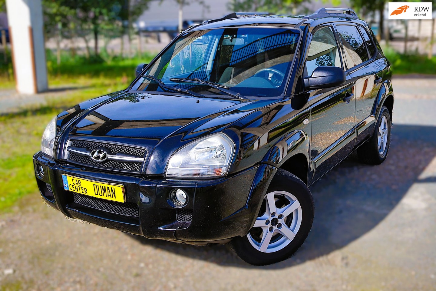 Hyundai Tucson - 2.0i Dynamic Executive NAP TREKHAAK CRUISE - AutoWereld.nl