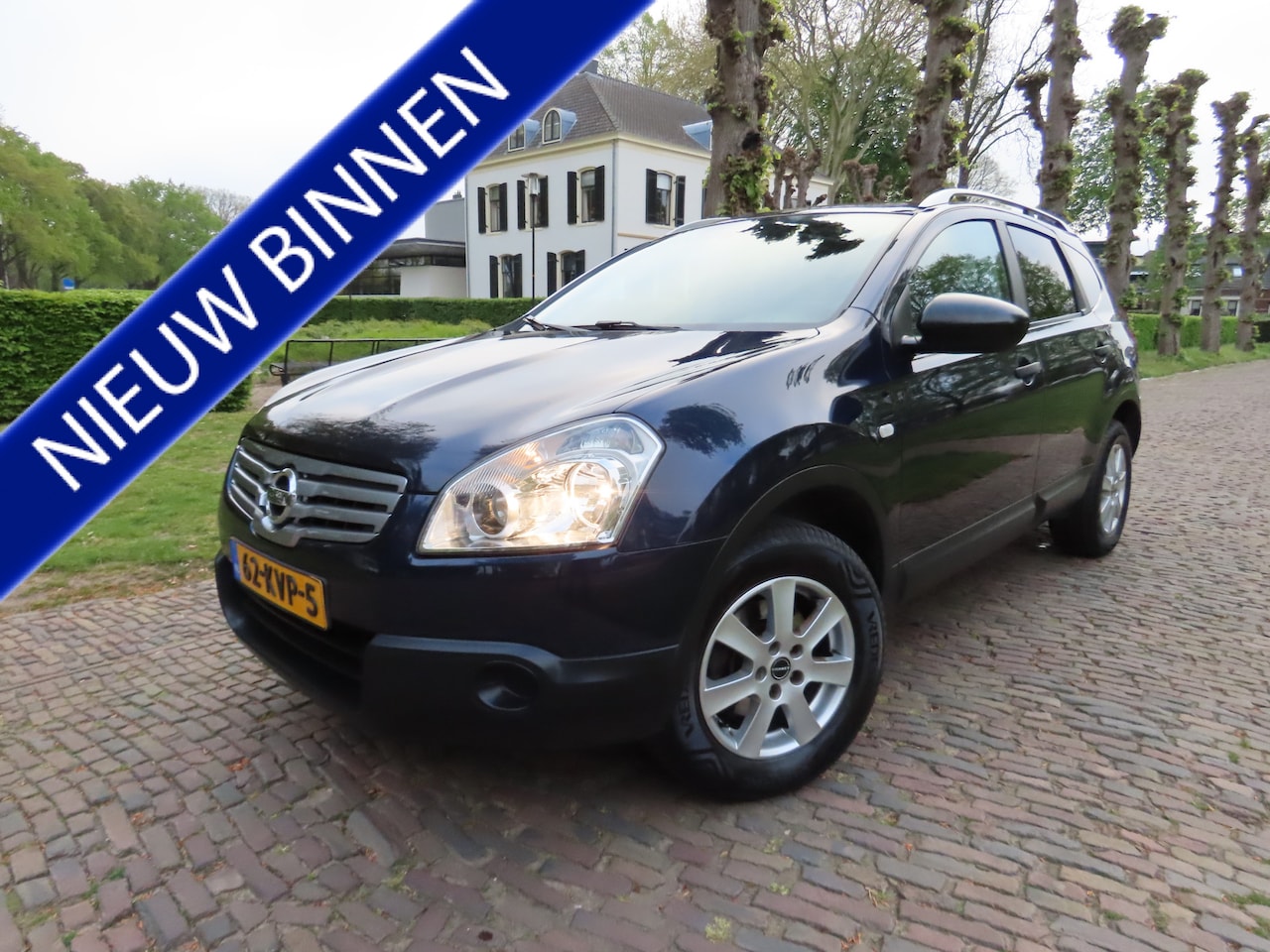 Nissan Qashqai - 1.6 Visia 7 Persoons Airco Navigatie Panoramadak Achteruitrijcamera Lm Velgen Trekhaak - AutoWereld.nl