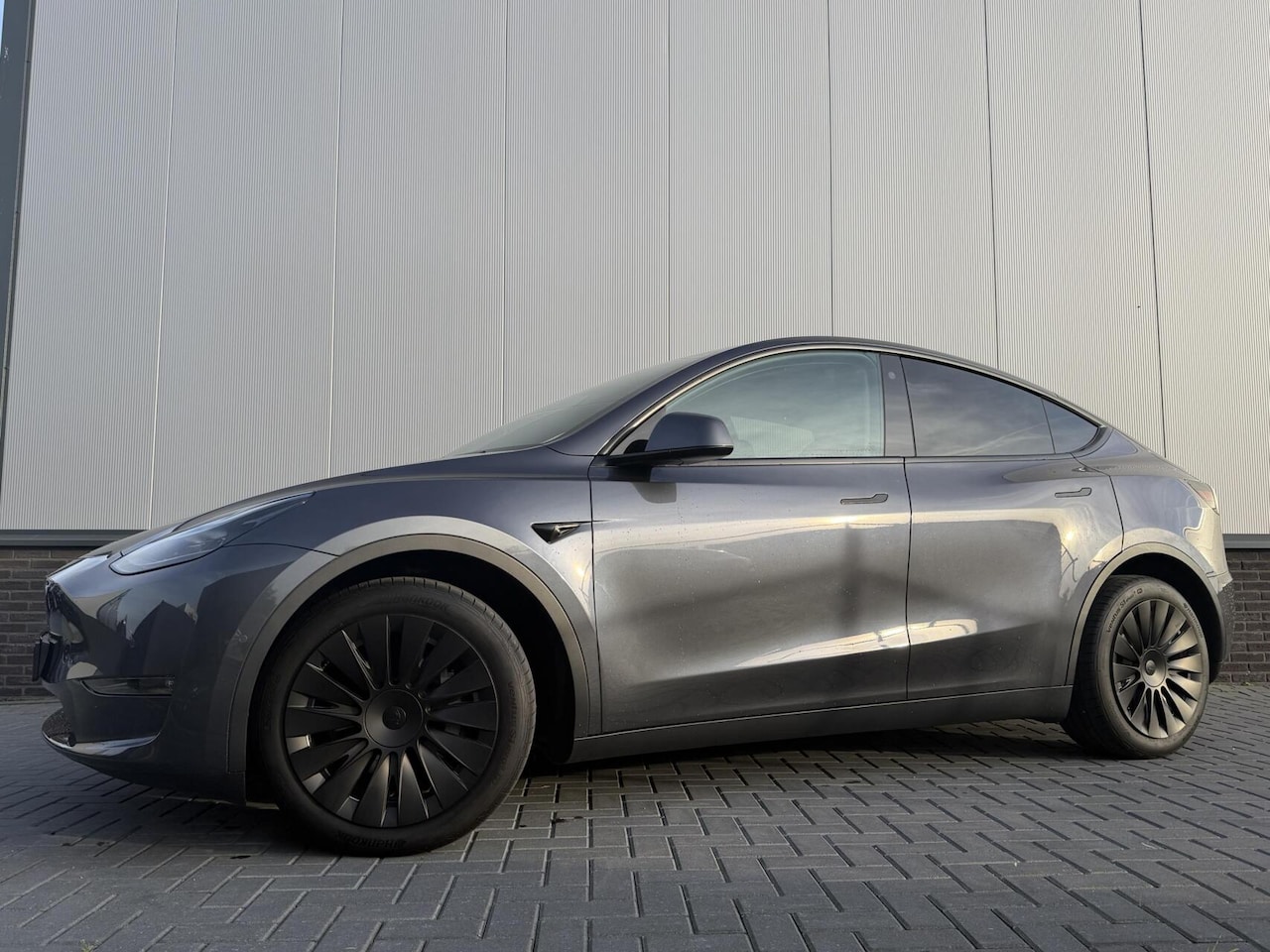 Tesla Model Y - Long Range AWD 75 kWh SOH 92% - AutoWereld.nl
