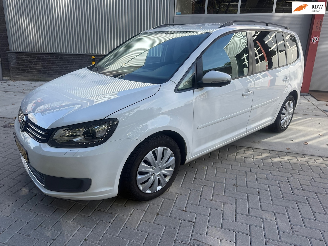 Volkswagen Touran - 1.2 TSI Trendline Bluemotion 7p. 1.2 TSI Trendline Bluemotion 7p. NAVI AIRCO - AutoWereld.nl