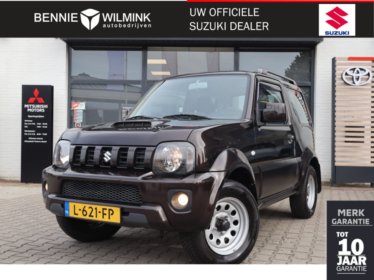 Suzuki Jimny - 1.3 Exclusive Automaat | 4X4 | All Seasons | Airco | Trekhaak - AutoWereld.nl