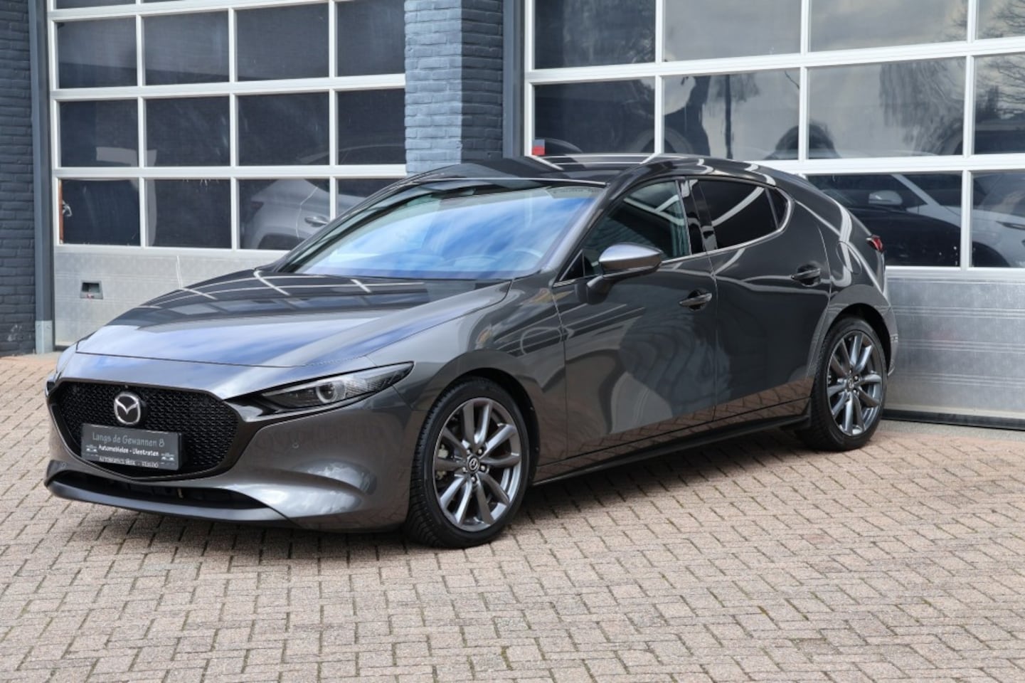 Mazda 3 - 2.0 e-SkyActiv-G M hybrid automaat 47547 kilometer - AutoWereld.nl