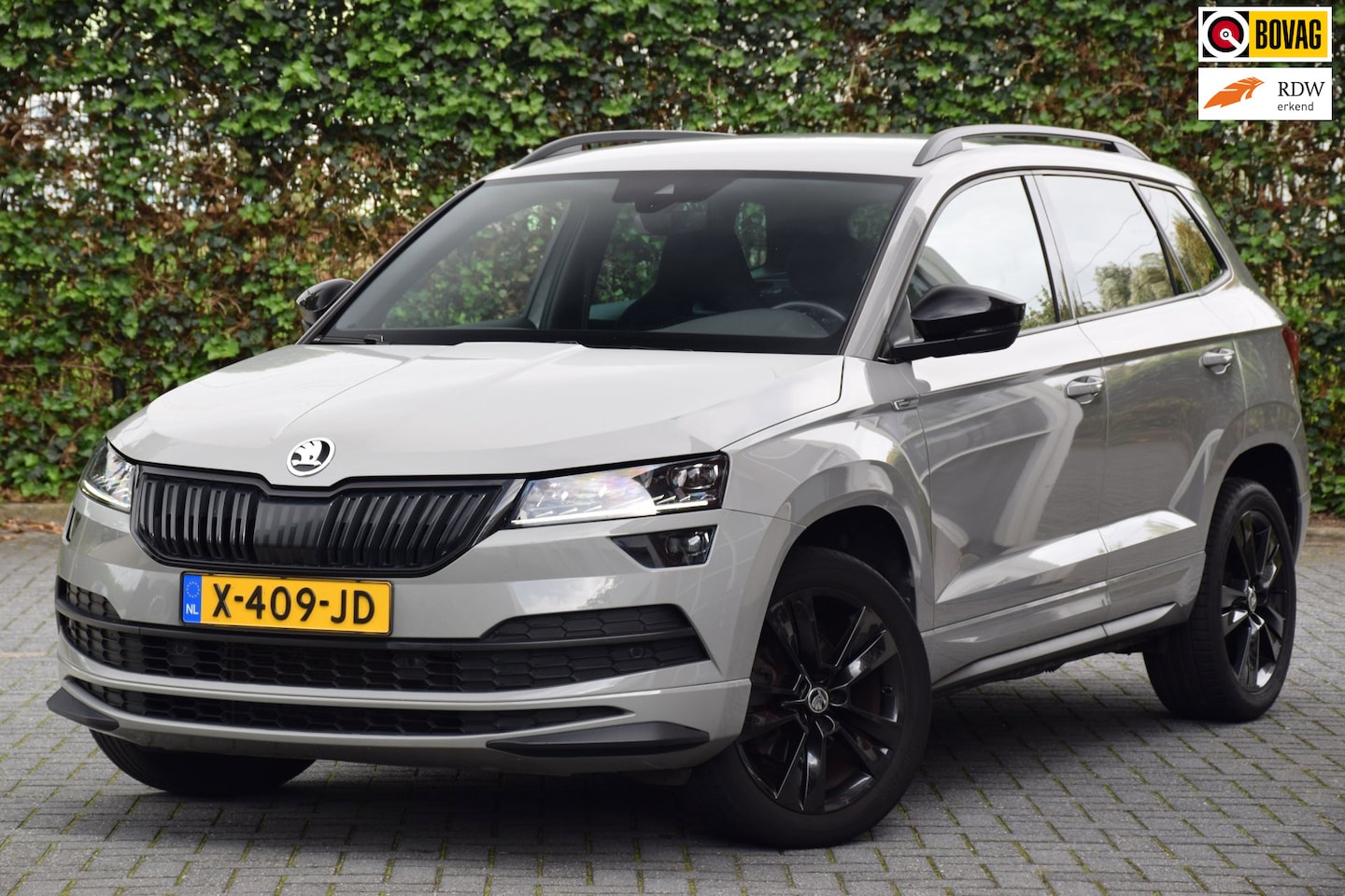 Skoda Karoq - 1.5 TSI ACT Sportline Business/Goed onderhouden/Virtual - AutoWereld.nl