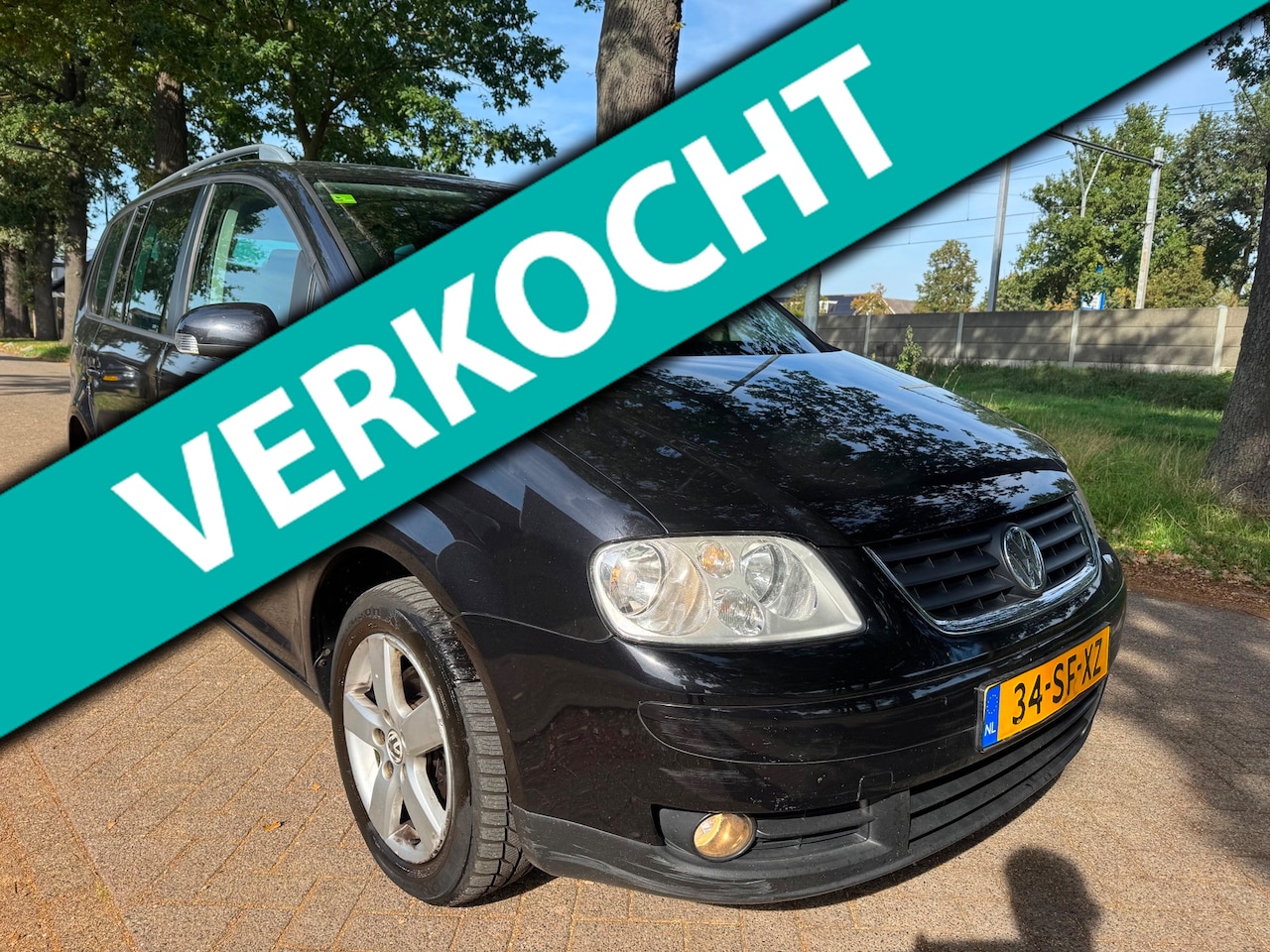 Volkswagen Touran - 2.0-16V FSI Highline automaat 2006 - AutoWereld.nl