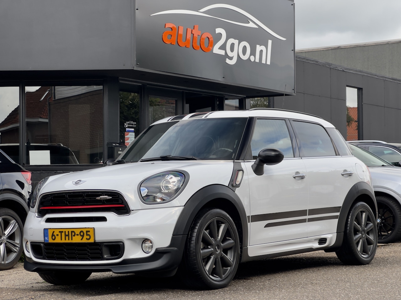 MINI Countryman - 1.6 Cooper S WORKS-DESIGN 101D.KM! PANODAK LEDER NAVI AIRCO LED LMV PDC - AutoWereld.nl