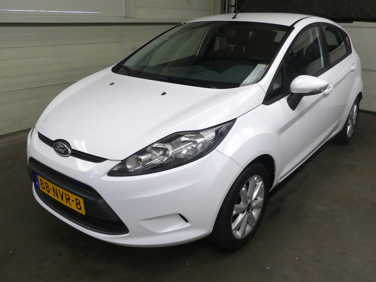 Ford Fiesta - 1.25 Limited - Airco - 5 deurs - Weinig Km Nap - AutoWereld.nl