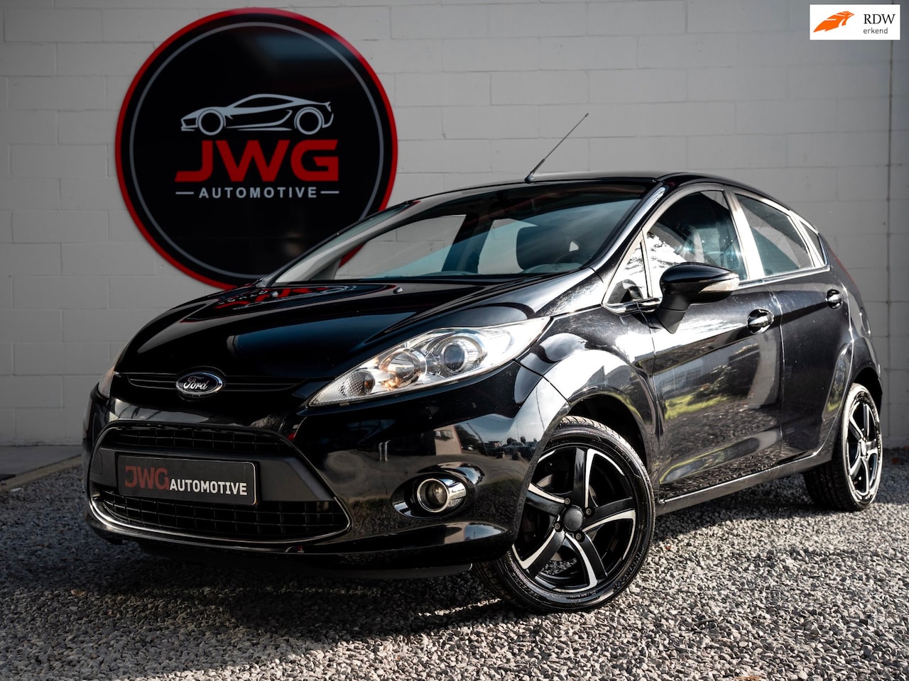 Ford Fiesta - 1.25 Ghia LM Velgen/Automatische airco - AutoWereld.nl