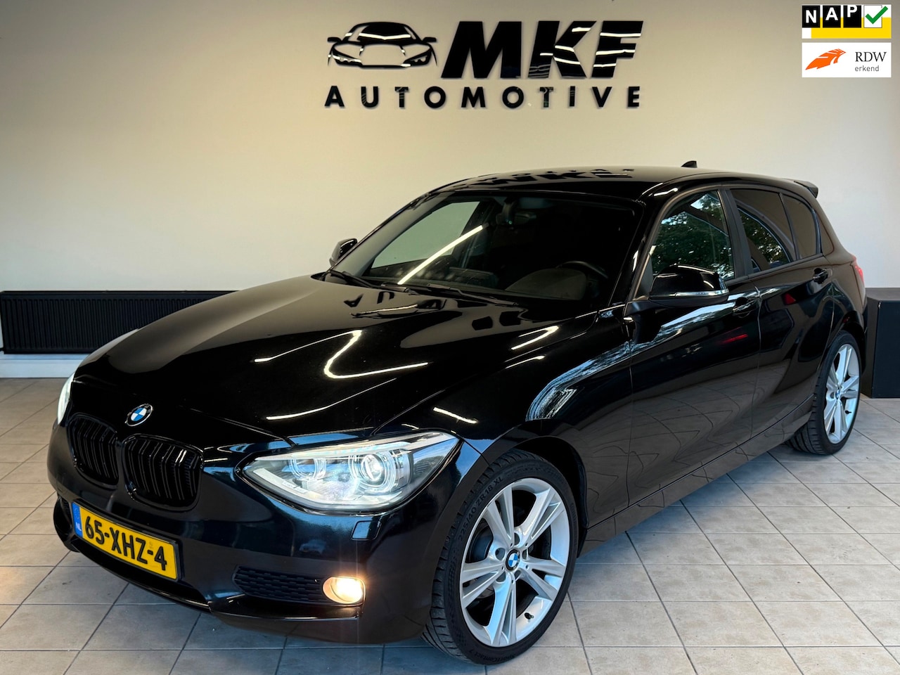 BMW 1-serie - 116D Business 2012 Zwart AIRCO|NAVI|XENON|NAP! - AutoWereld.nl