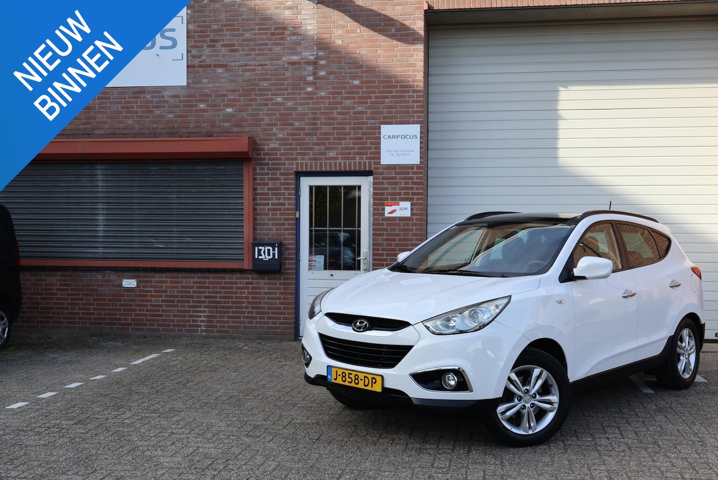 Hyundai ix35 - 2.0i 4WD Style Pano Navi Camera APK Leder Cruise Trekhaak - AutoWereld.nl