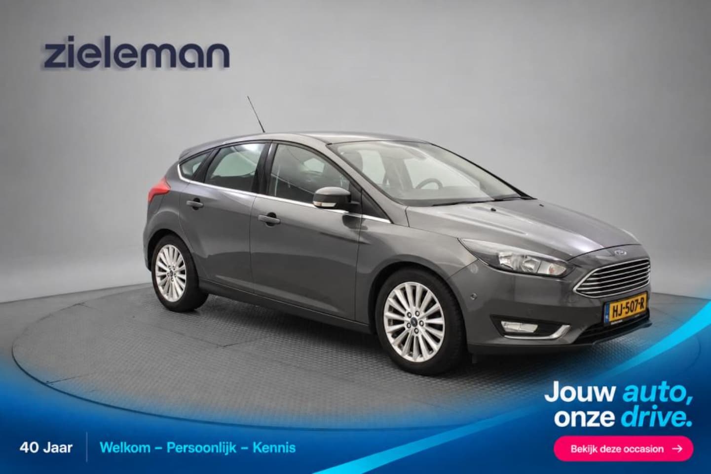 Ford Focus Wagon - 1.0 Titanium - Navi, Clima, Trekhaak, cruise - AutoWereld.nl