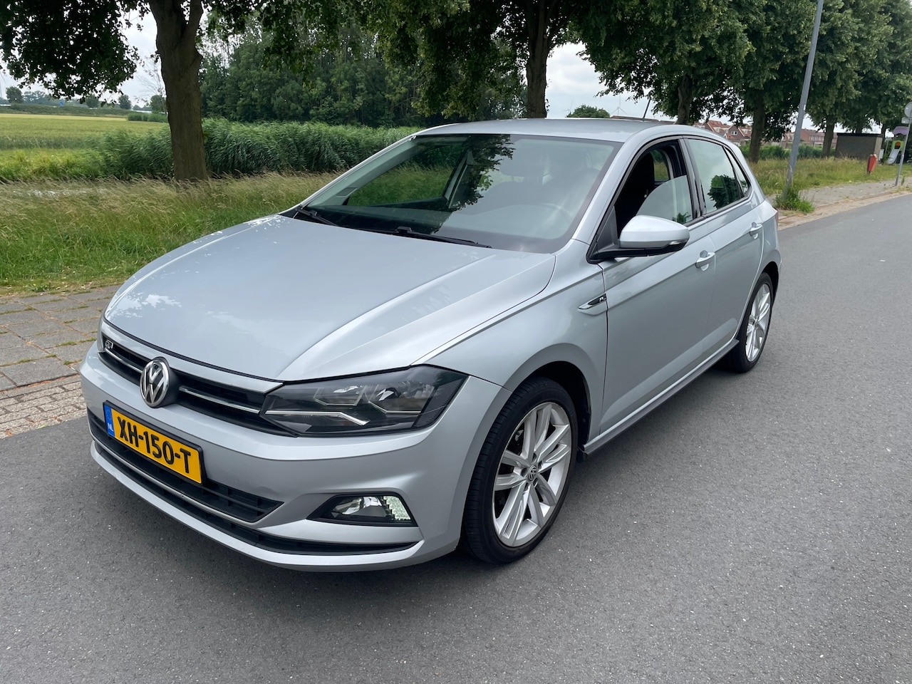 Volkswagen Polo - 1.0 MPI R-LINE/NAVI/AIRCO/VELGEN - AutoWereld.nl