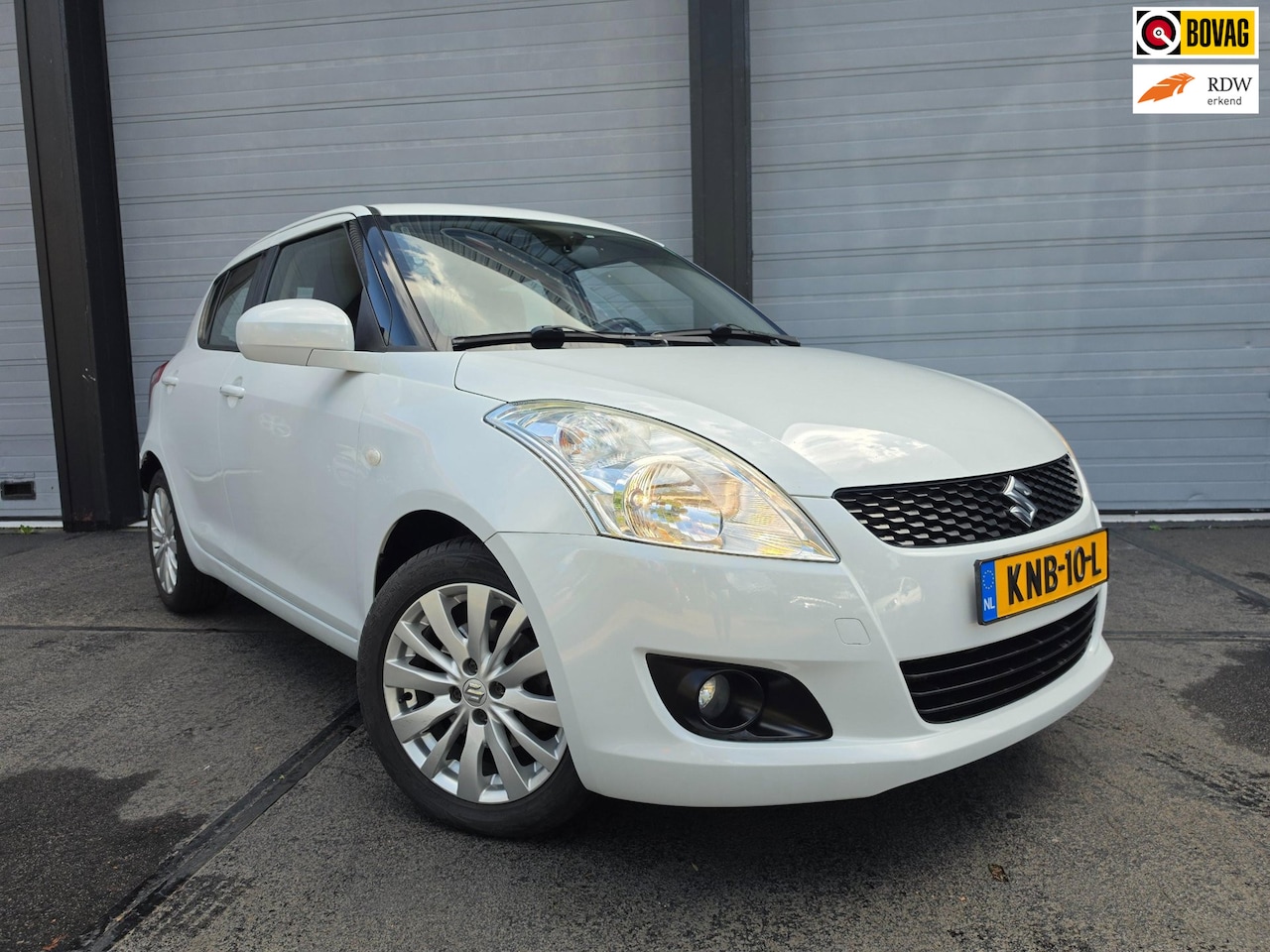 Suzuki Swift - 1.2 Exclusive INDIGO edition, cruise, open dak, pdc, nette staat, nieuwe apk - AutoWereld.nl