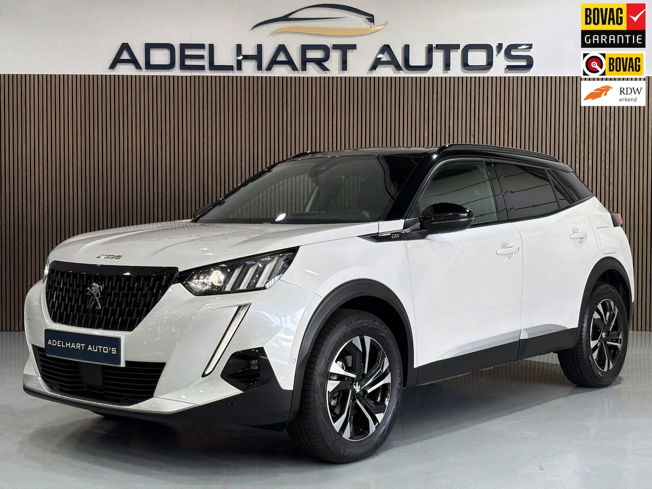 Peugeot 2008 - 1.2 PureTech GT Automaat / Navigatie full map / Camera / Cruise control / Lederen interieu - AutoWereld.nl