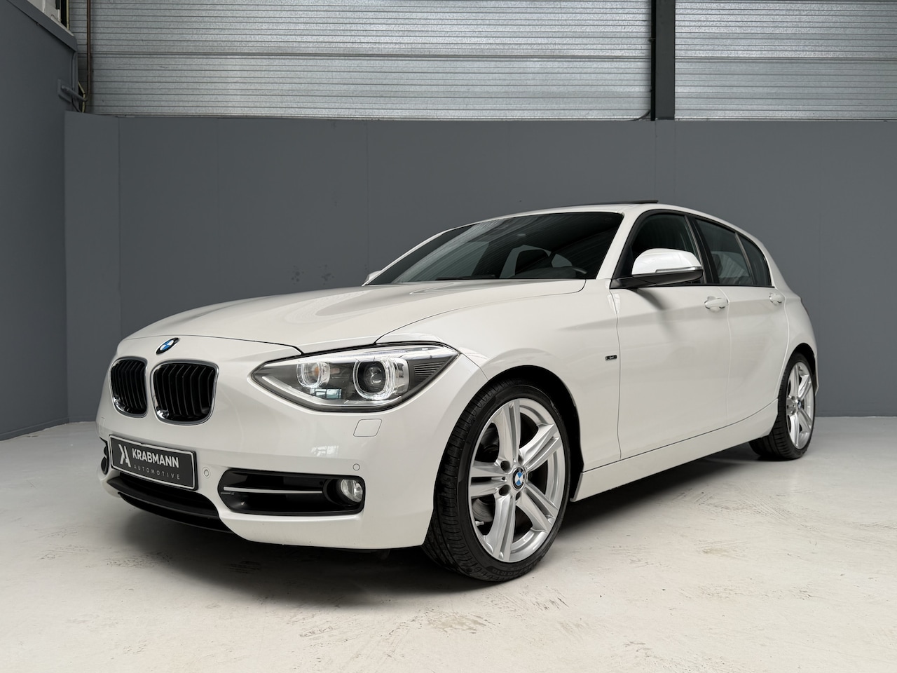 BMW 1-serie - 118i Business Sport GARANTIE|Cruise|Navi-Prof|Xenon - AutoWereld.nl