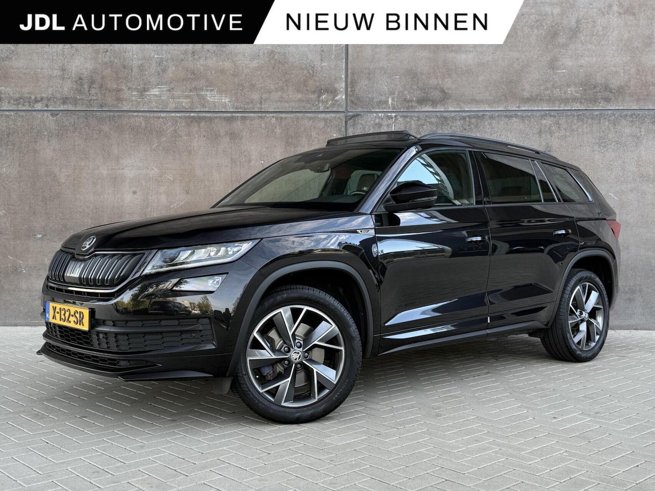 Skoda Kodiaq - 2.0 TSI 4x4 Sportline Business | Panorama dak | Adaptieve Cruise | Dealer onderhouden | Me - AutoWereld.nl