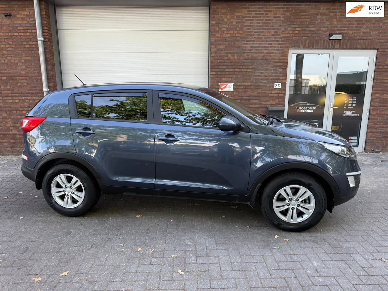 Kia Sportage - 2.0 X-ecutive|AUTOMAAT|AIRCO|NIEUWE APK - AutoWereld.nl