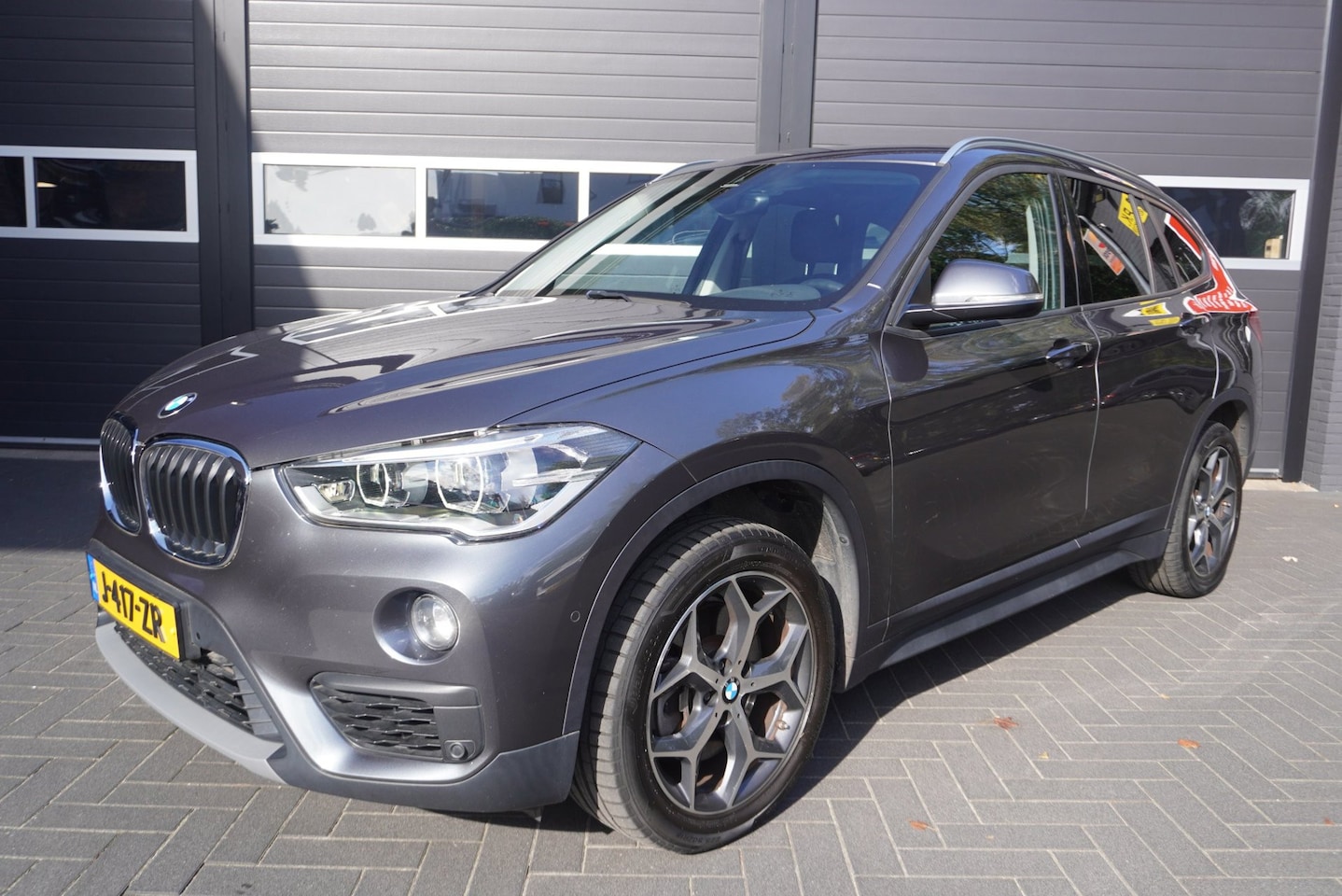 BMW X1 - XDrive20i Aut/Camera/Trekhaak afneembaar/Park.sensoren/Cruise/Navi/Climate Control - AutoWereld.nl