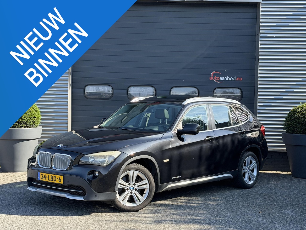 BMW X1 - xDrive23d Executive | Panoramadak | Lederen Bekleding | Navigatie | Climate Control | Trek - AutoWereld.nl