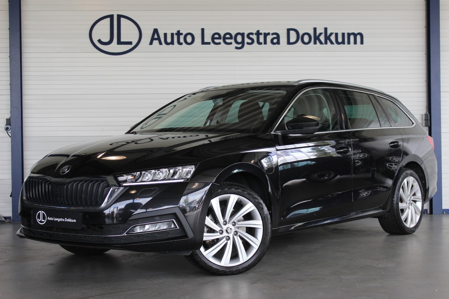 Skoda Octavia Combi - 1.4 TSI iV PHEV Business Edition Trekhaak | Carplay | Stoelverw. | Camera | Navi | Bluetoo - AutoWereld.nl