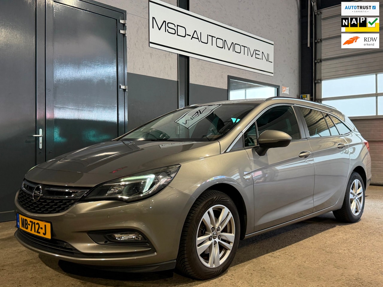 Opel Astra Sports Tourer - 1.4 Business+ 150pk Onderhouden Navigatie NAP - AutoWereld.nl