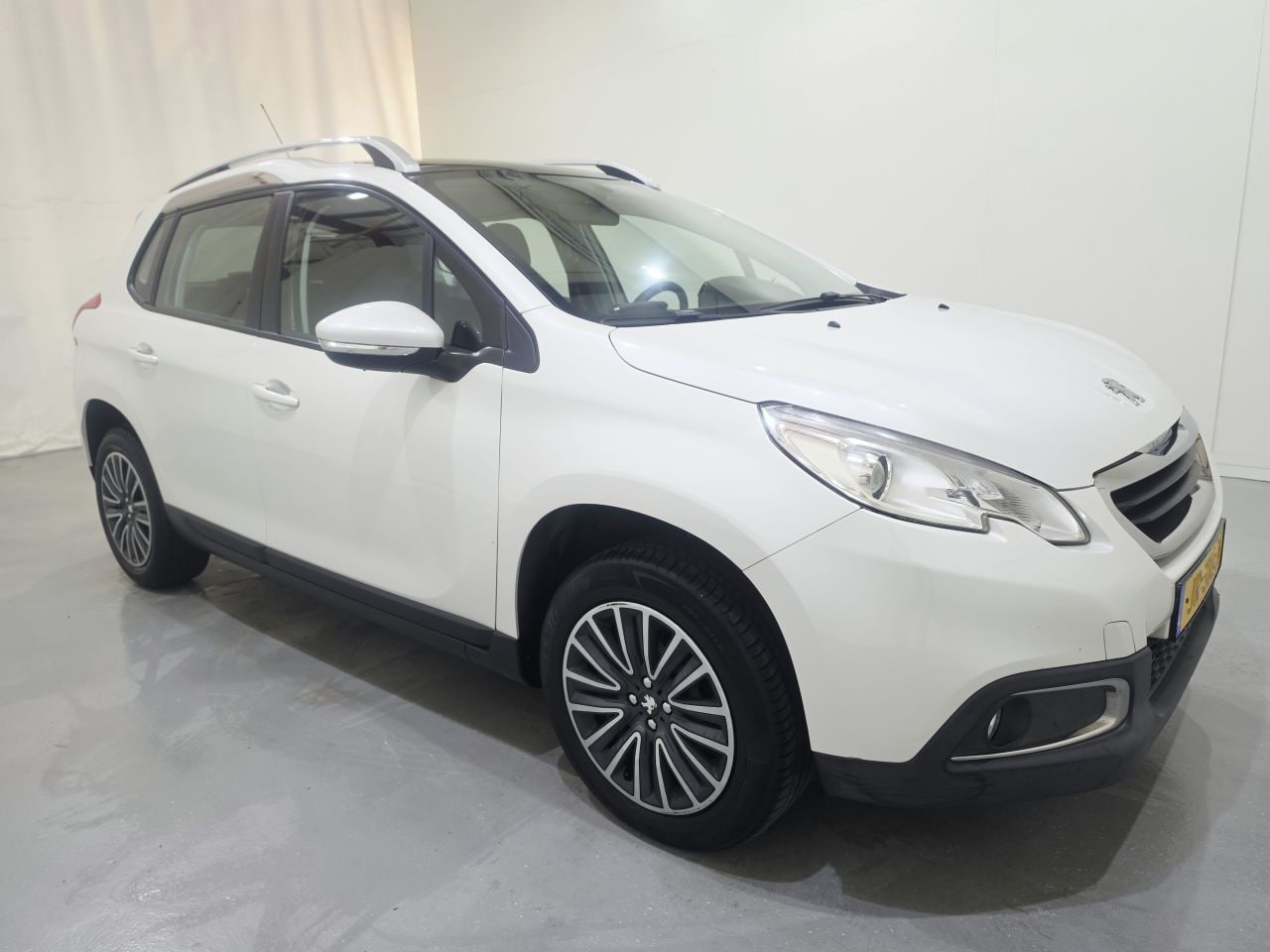 Peugeot 2008 - 1.2 PureTech Blue Lion AC Navi Panoramadak - AutoWereld.nl
