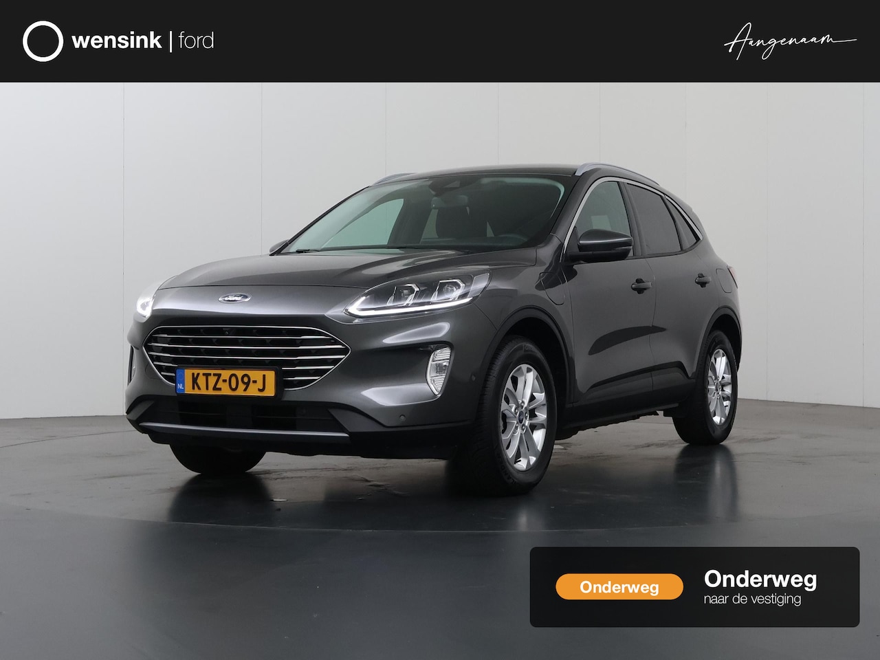 Ford Kuga - 2.5 PHEV Titanium | Adaptieve Cruise Control | Winterpakket | Parkeercamera | HUD | Elektr - AutoWereld.nl