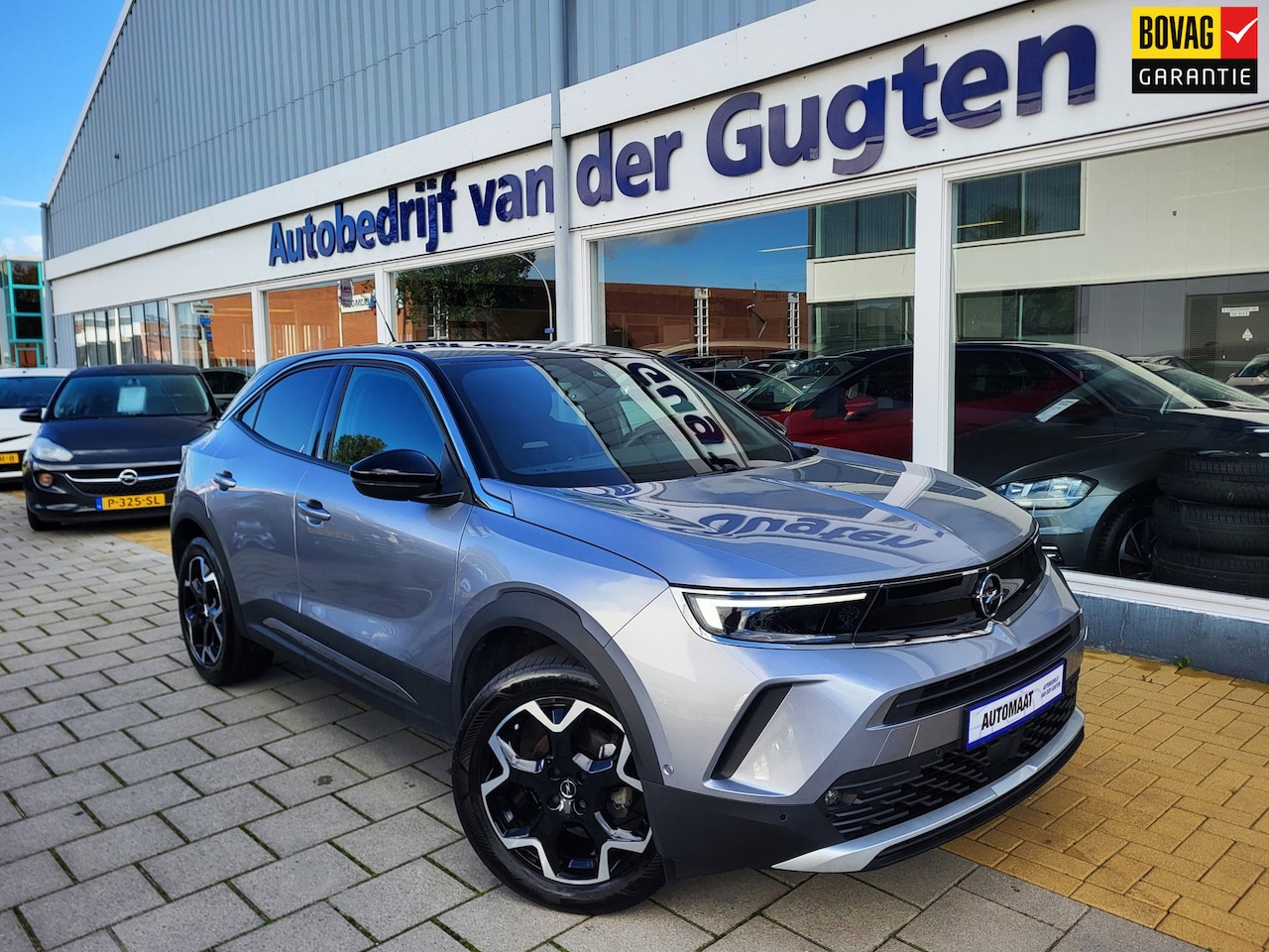 Opel Mokka - 1.2 Turbo Ultimate / Camera / Carplay & Android / Stoel -en Stuurverwarming / - AutoWereld.nl