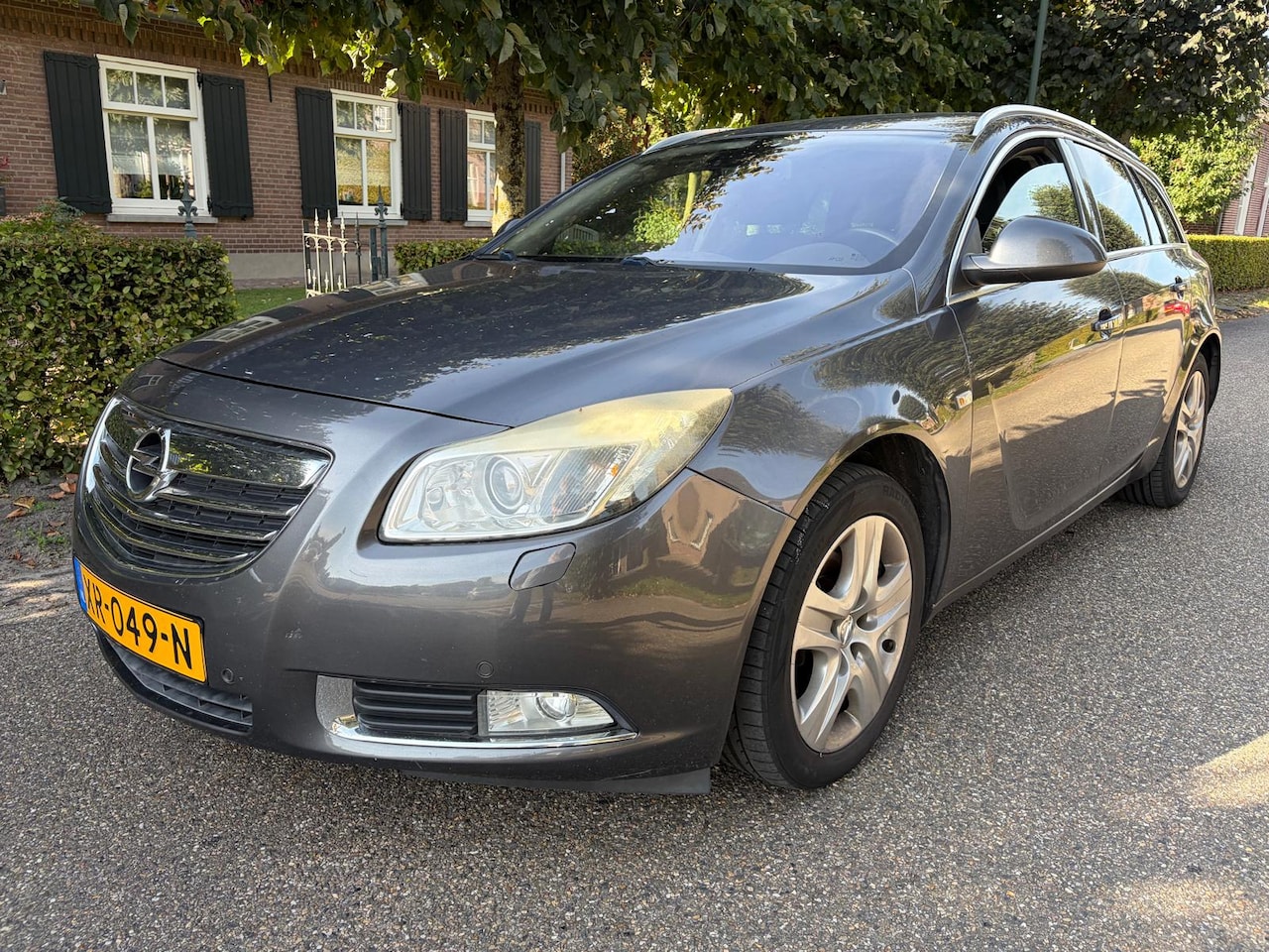 Opel Insignia - 1.8 Sport Tourer Edition - AutoWereld.nl