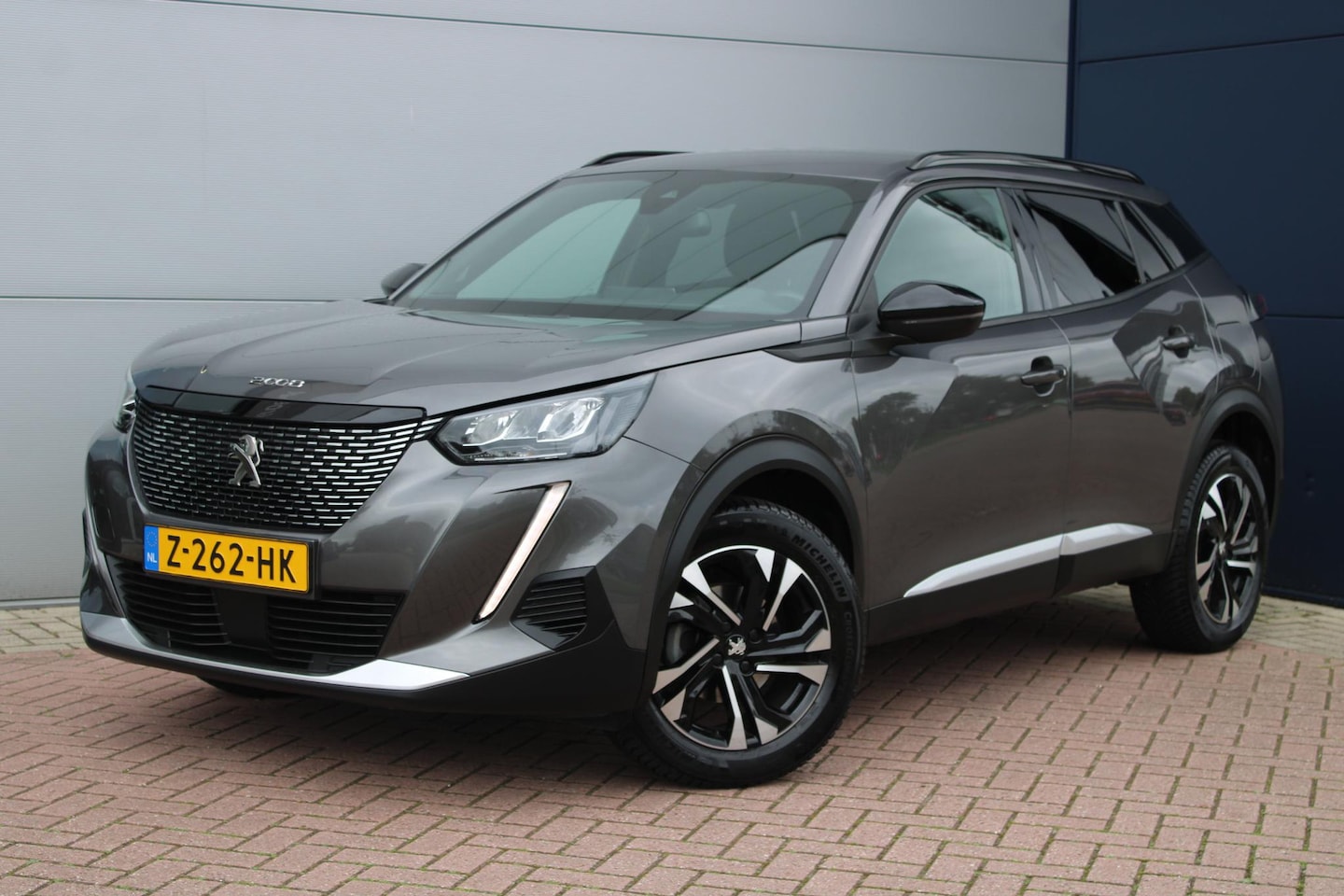 Peugeot 2008 - 1.2 PureTech Allure Pack NAVIGATIE - TREKHAAK - AUTOMAAT - AutoWereld.nl