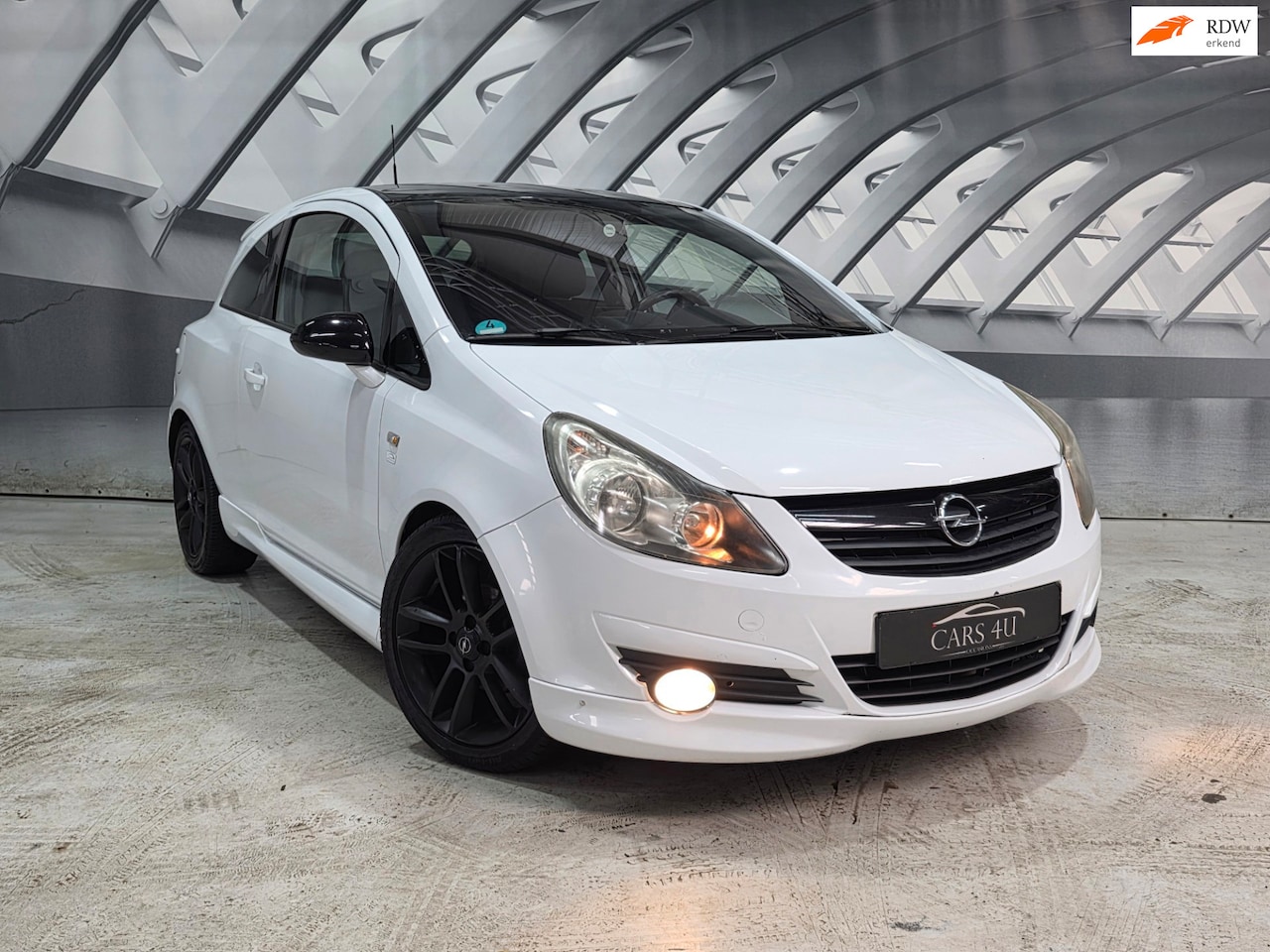 Opel Corsa - 1.4-16V Enjoy limited edition - AutoWereld.nl