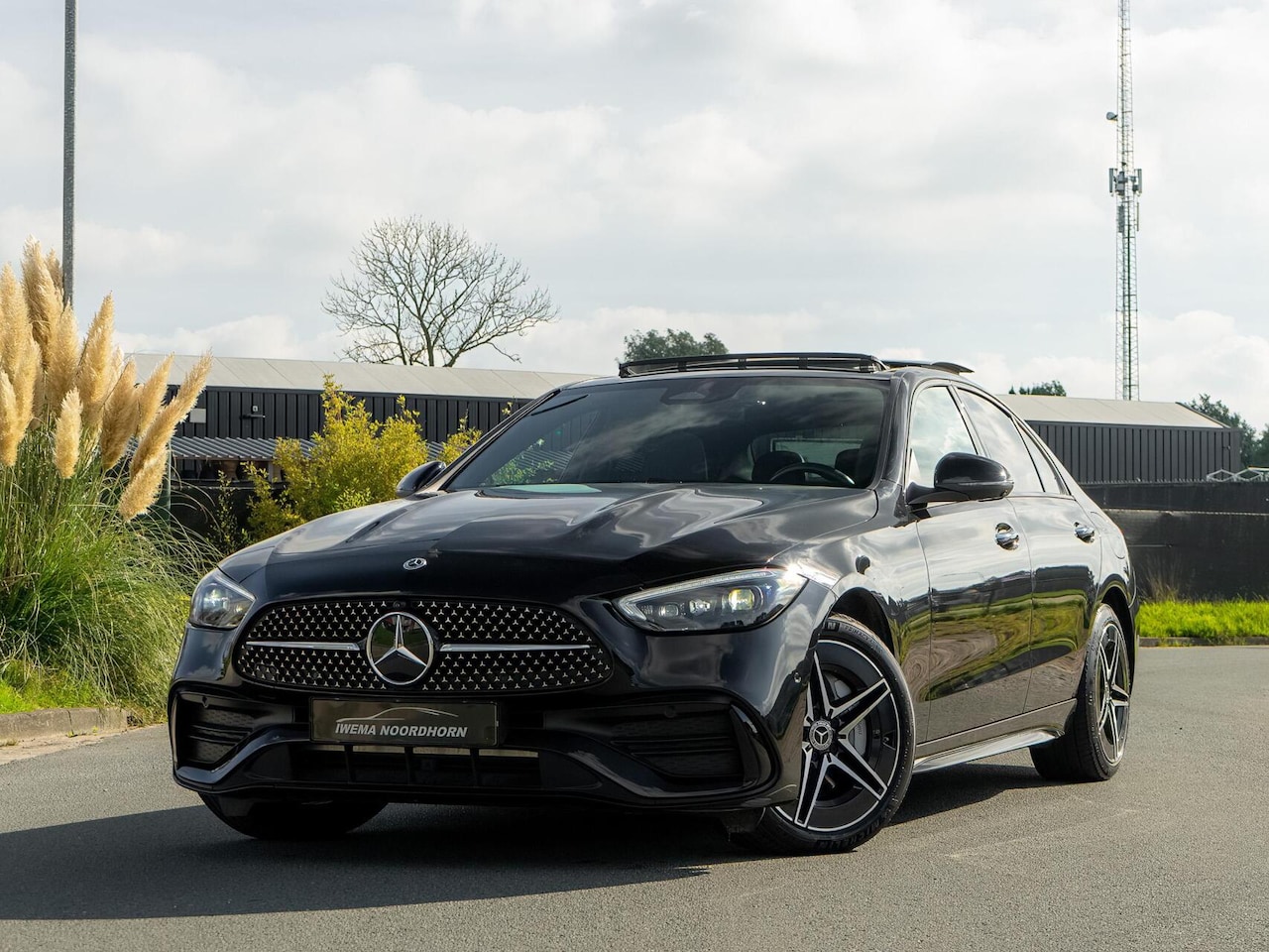 Mercedes-Benz C-klasse - 400 e 4MATIC AMG Panoramadak|360°Camera|Burmester®|Keyless|Luchtvering|Massage|HUD|Stoelve - AutoWereld.nl