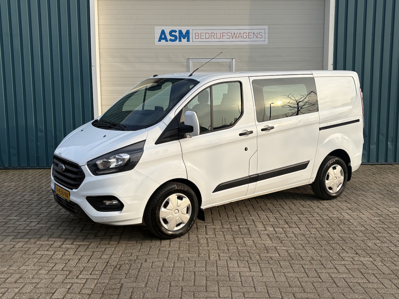 Ford Transit Custom - 320 2.0 131Pk TDCI L1H1 Trend DC / Cruise / Airco / 2x SCHUIFDEUR / Trekhaak / Apk t/m 14- - AutoWereld.nl