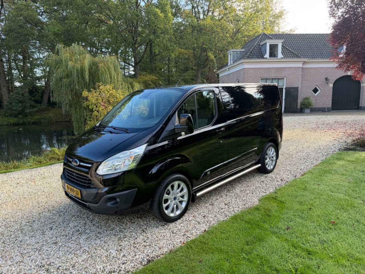 Ford Transit Custom - L1H1 170pk 50th anniverary Limited Edition - AutoWereld.nl