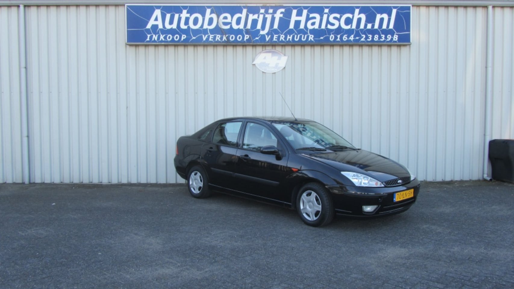 Ford Focus - 1.4 I SDN Edition - AutoWereld.nl