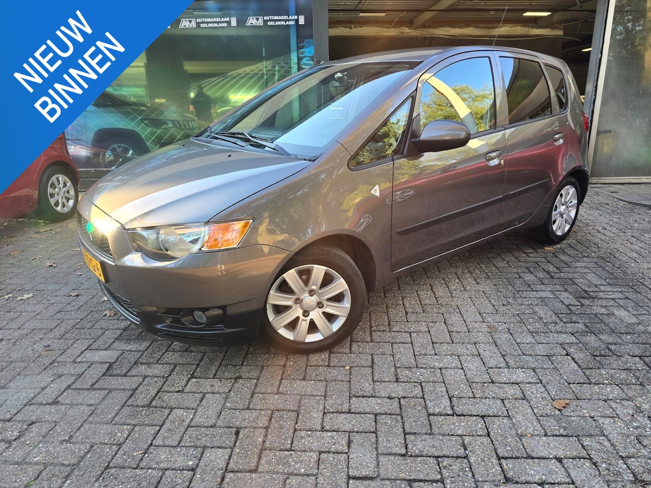 Mitsubishi Colt - 1.3 Edition Two | 2E EIGENAAR | 3/6 OF 12MND GARANTIE | 64.464 KM | AIRCO | LMV | CRUISE | - AutoWereld.nl