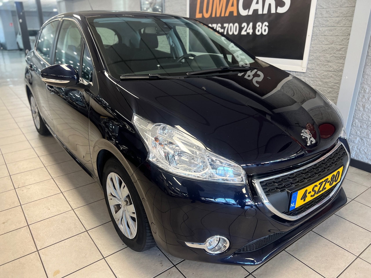 Peugeot 208 - 1.2 VTi Envy | Distri. V.V. | Cruise | Navi |PDC - AutoWereld.nl