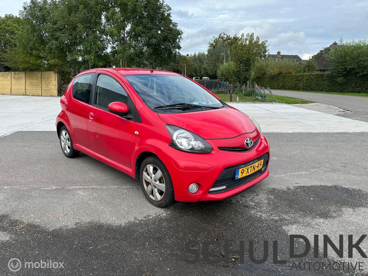 Toyota Aygo - 1.0 VVT-i Dynamic Orange AIRCO KOUD|5 DEURS|TOMTOM - AutoWereld.nl