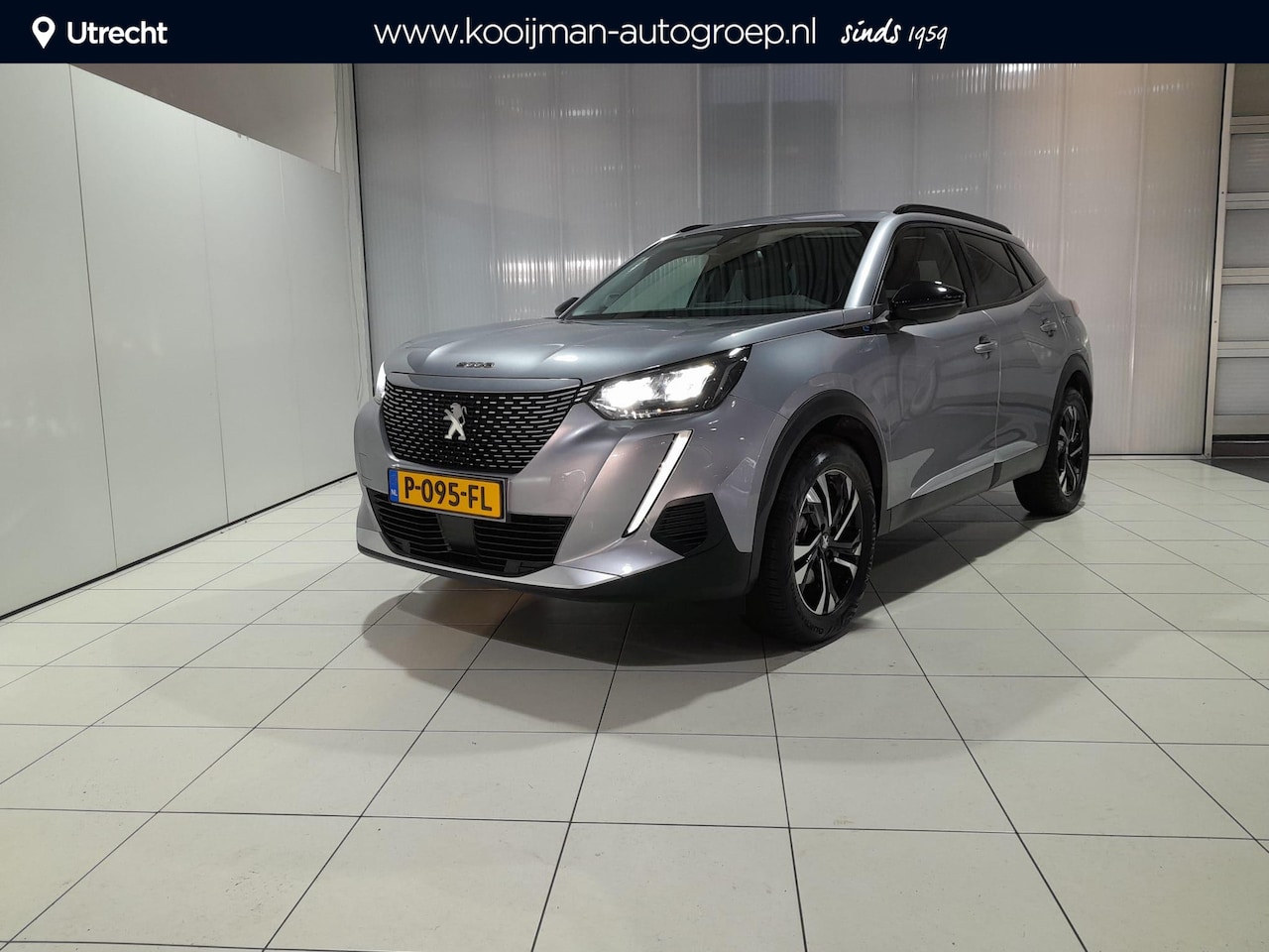 Peugeot e-2008 - EV Allure 50 kWh Navigatie , LED mistlampen , All season banden - AutoWereld.nl