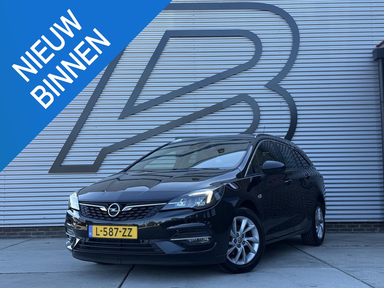 Opel Astra Sports Tourer - 1.2 Business Elegance 2e Eigenaar|Camera|Carplay|Trekhaak|PDC V+A|Navi|Cruise|Elek ramen|N - AutoWereld.nl